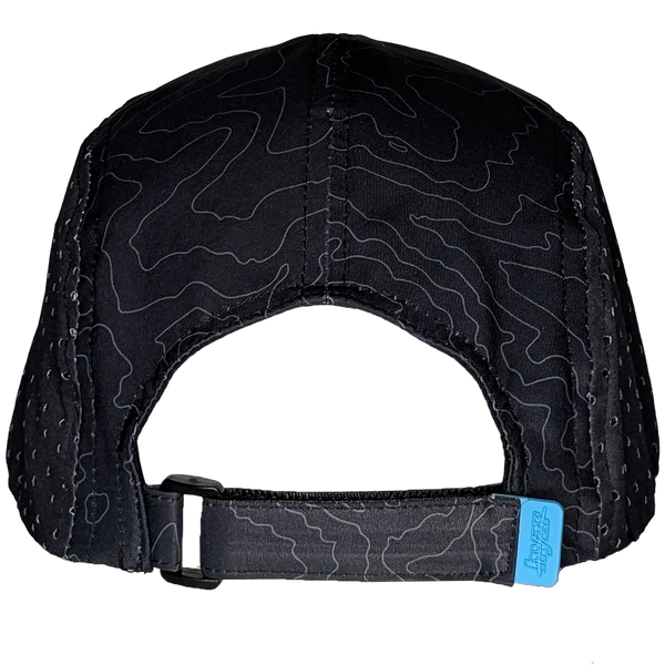 Back view of the Leda Stride Hat showing the adjustable velcro strap with rubber tab. Charcoal 5-panel hat, with a topographical print and pops of mint.