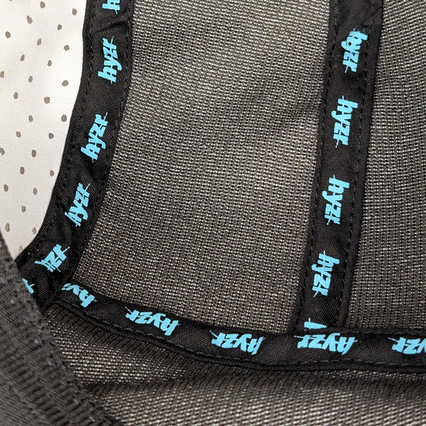 Inside view of the Leda Stride Hat, featuring miniature Hyzr logos on the seam taping.