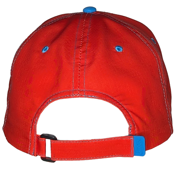 Back view of the Naiad Core Hat showing the adjustable velcro strap with rubber tab. Red dad cap, with a triangle print and pops of blue.