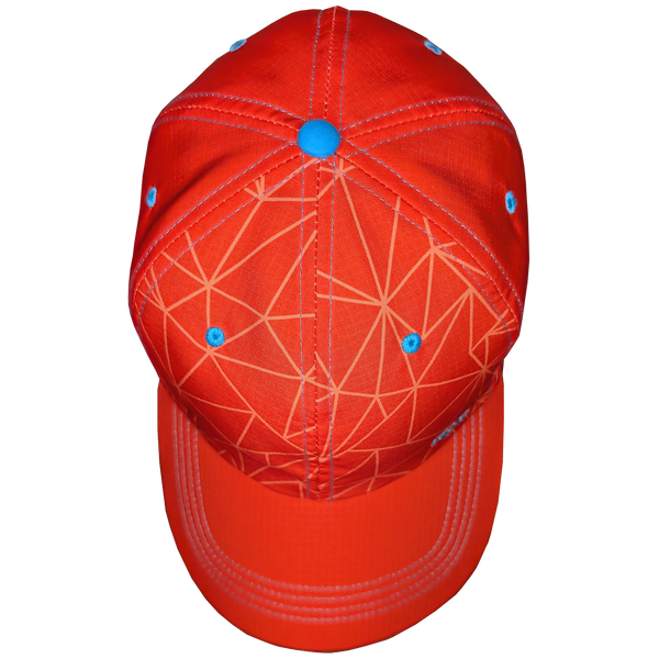 Top view of the Naiad Core Hat. Red dad cap, with a triangle print and blue logo and button.
