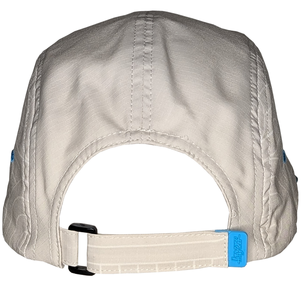 Back view of the Styx Trail Hat showing the adjustable velcro strap with rubber tab. Cement colored 5-panel hat, with a zen garden print and pops of electric blue.