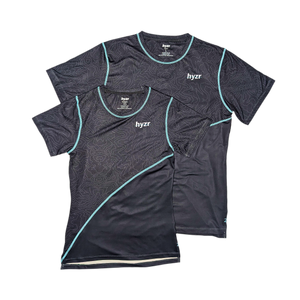 Flat images of both women's and men's Titan Performance Tee in Charcoal.